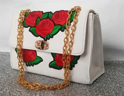 Moss White flowered skin leather handbag